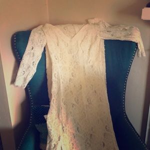 Long cream lace dress.  Can be worn over a slip